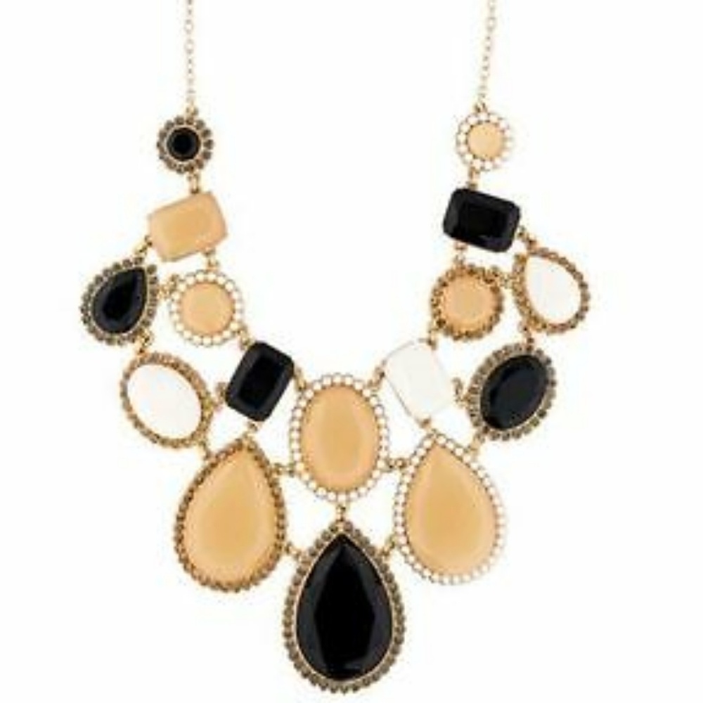 NWT Run Around necklace in gold black and cream